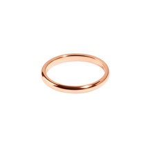Rose gold ring on a white background