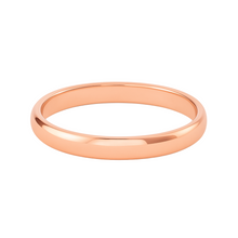 Rose gold ring on a white background